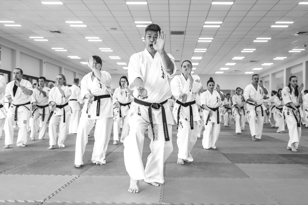 Kyokushin karateka training together in a large group