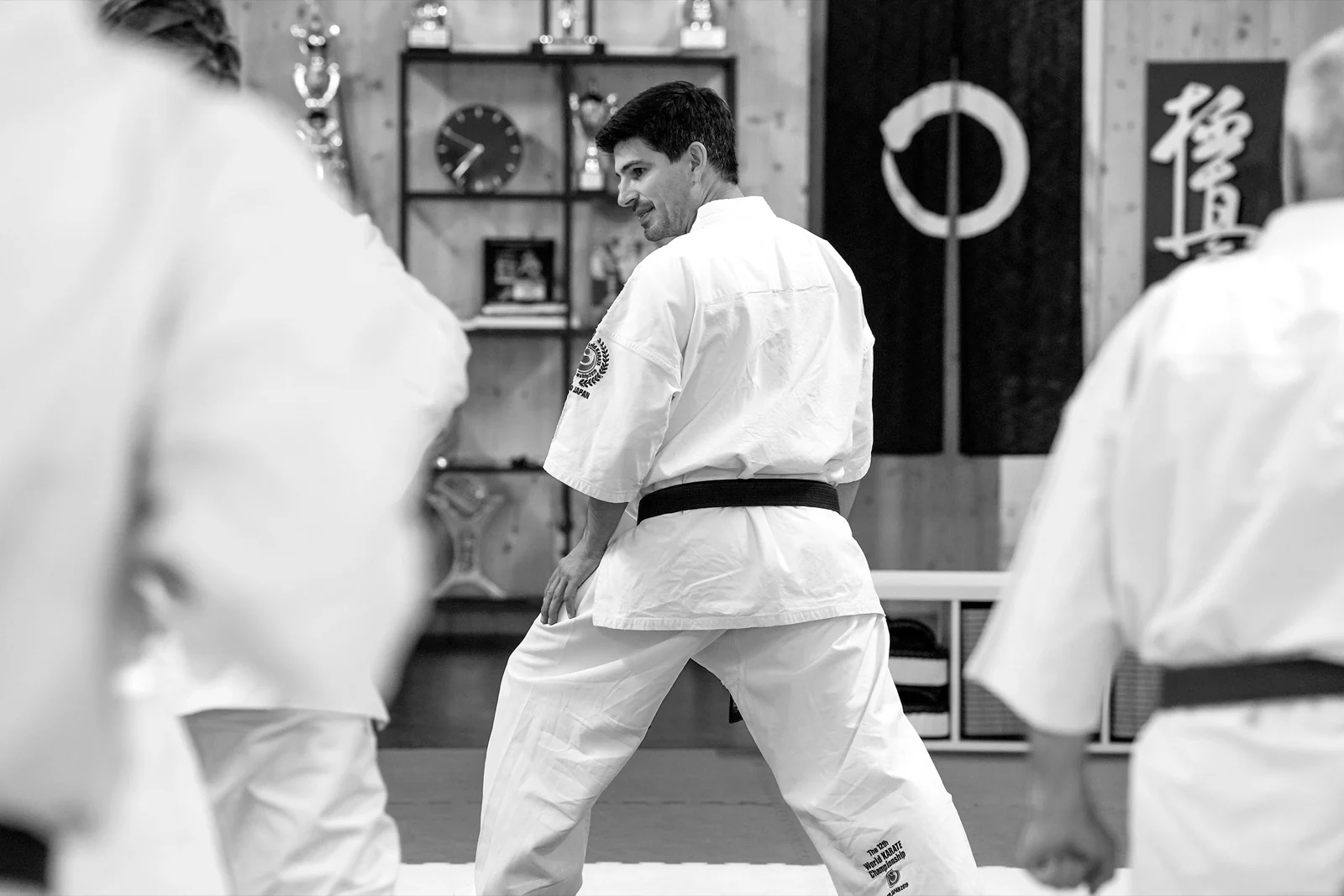 A Kyokushin Sensei teaching students in the dojo