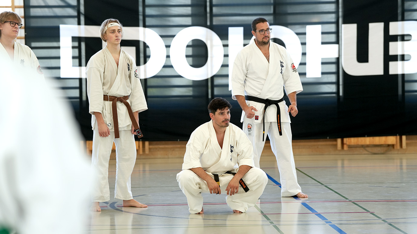 Karateka listening during the dojoHUB Kumite Seminar in Baden