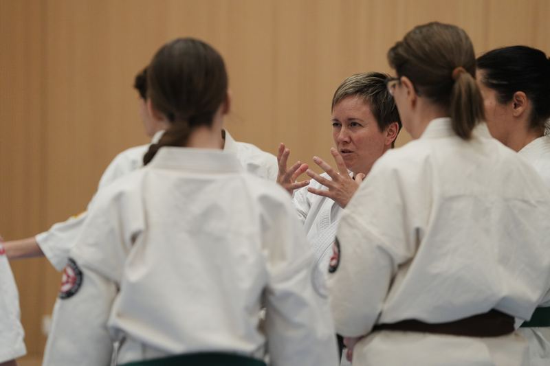 Participants discussing a technique
